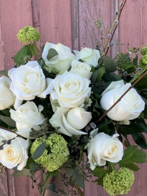 Playa Blanca; Half Dozen White Roses in a vase